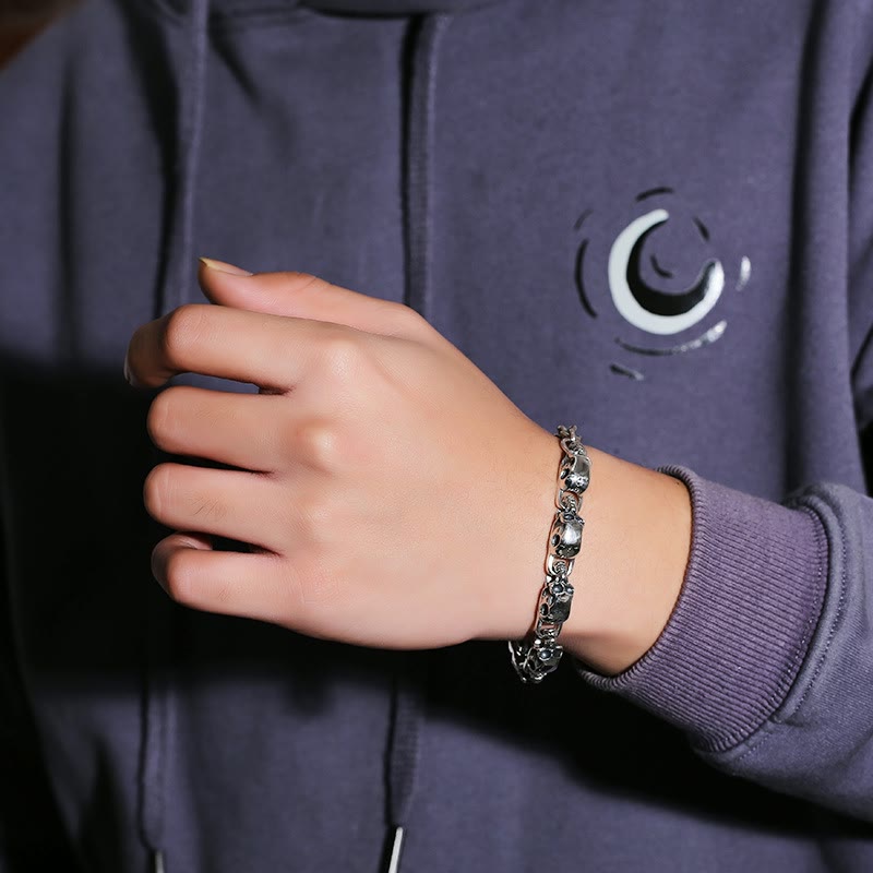 Sterling silver skull link bracelet